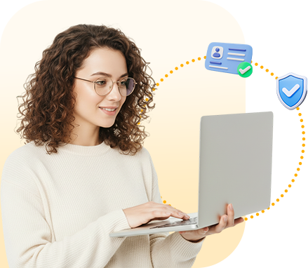 Compliance analyst reviewing a business file on a laptop